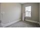 Empty bedroom with carpeted floor and natural light at 5911 Steward St # 24, Hanahan, SC 29410