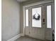 Inviting entryway featuring a frosted glass door with sidelights and decorative wreath at 5911 Steward St # 24, Hanahan, SC 29410