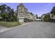 Charming townhouse featuring a one-car garage and neatly paved driveways at 5911 Steward St # 24, Hanahan, SC 29410