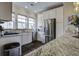 Modern kitchen featuring granite countertops, stainless steel appliances, and ample cabinet space at 5911 Steward St # 24, Hanahan, SC 29410
