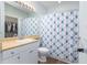 Bathroom features a shower, vanity, mirror and view into a closet at 600 Bucksley Ln # 305, Charleston, SC 29492