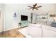 Cozy living room featuring a TV, comfortable seating, and an open view of the kitchen at 600 Bucksley Ln # 305, Charleston, SC 29492