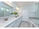 Elegant bathroom with double vanity, luxurious soaking tub, glass shower, and modern fixtures at 6176 Wilkes Pond Dr, Hollywood, SC 29449