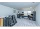 Well-lit bonus room with a built-in desk, lots of guitar cases, and neutral carpet at 6176 Wilkes Pond Dr, Hollywood, SC 29449