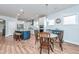Spacious kitchen featuring an island, stainless steel appliances, and a cozy breakfast table at 6176 Wilkes Pond Dr, Hollywood, SC 29449