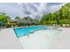 Enjoy the community pool with a splash pad, lounge chairs, and beautifully landscaped grounds, creating an inviting oasis at 6176 Wilkes Pond Dr, Hollywood, SC 29449