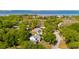 Stunning aerial view showcases this charming home nestled among mature trees, near beautiful waterway views at 679 Clearview Dr, Charleston, SC 29412