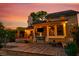 Well-lit backyard deck with comfortable seating and string lights, perfect for evening relaxation and entertainment at 679 Clearview Dr, Charleston, SC 29412