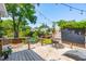 Charming backyard with wooden deck, string lights, and ample seating, creating a perfect outdoor entertaining space at 679 Clearview Dr, Charleston, SC 29412