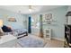 Stylish bedroom featuring bright walls, a ceiling fan, and a cozy rug, creating a comfortable and inviting space at 679 Clearview Dr, Charleston, SC 29412