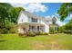 Charming two-story home with a welcoming front porch and beautifully landscaped front yard at 679 Clearview Dr, Charleston, SC 29412