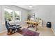 Bright office featuring large windows, a ceiling fan, and a spacious desk setup perfect for working from home at 679 Clearview Dr, Charleston, SC 29412