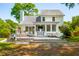 This home showcases a large deck, outdoor TV, and a well-manicured yard, perfect for outdoor entertaining at 679 Clearview Dr, Charleston, SC 29412