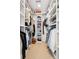 Spacious walk-in closet with custom white shelving and ample storage space for clothes, shoes, and accessories at 679 Clearview Dr, Charleston, SC 29412