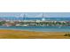 Scenic view showcases the city skyline and bridge, juxtaposed against a tranquil expanse of water and marshland at 700 Daniel Ellis Dr # 4104, Charleston, SC 29412