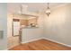 Open dining area features hardwood floors and a modern light fixture at 700 Daniel Ellis Dr # 4104, Charleston, SC 29412