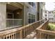 Building exterior featuring a ramp leading to residences and landscaped grounds at 700 Daniel Ellis Dr # 4104, Charleston, SC 29412