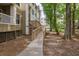 Building exterior featuring a ramp with lots of trees nearby at 700 Daniel Ellis Dr # 4104, Charleston, SC 29412