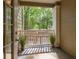 Cozy outdoor patio shows view of lush trees and nature beyond at 700 Daniel Ellis Dr # 4104, Charleston, SC 29412