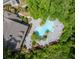 Aerial view of a resort-style pool surrounded by lush landscaping, creating a serene oasis at 700 Daniel Ellis Dr # 4104, Charleston, SC 29412