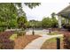 A community pool is surrounded by lush greenery and offers a serene escape for relaxation and recreation at 700 Daniel Ellis Dr # 4104, Charleston, SC 29412