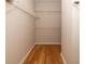 Walk-in closet features hardwood floors and wire shelving at 700 Daniel Ellis Dr # 4104, Charleston, SC 29412