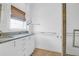 Clean bathroom with granite counters, double sinks, and a modern walk-in shower at 71 Cypress St, Charleston, SC 29403