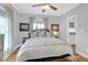 Cozy bedroom featuring a ceiling fan, neutral color palette, and natural light at 71 Cypress St, Charleston, SC 29403