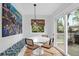 Bright dining area featuring natural light and a view to the porch at 71 Cypress St, Charleston, SC 29403