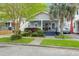 Charming single-story home with a cozy front porch and well-manicured landscaping at 71 Cypress St, Charleston, SC 29403