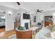 Spacious living room with a fireplace, hardwood floors, and comfortable seating at 71 Cypress St, Charleston, SC 29403