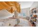 Cozy bedroom with lots of natural light, rug, and a bookshelf at 7414 Purser Ln, Hanahan, SC 29410