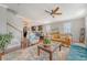 Open-concept living space featuring hardwood floors flowing into the dining and kitchen, ideal for entertaining and everyday living at 7414 Purser Ln, Hanahan, SC 29410