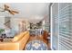 Bright, open-concept living space featuring hardwood floors and seamless flow to the dining area, creating a welcoming atmosphere at 7414 Purser Ln, Hanahan, SC 29410