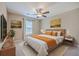 Cozy bedroom with artwork and a bedside table, offering a stylish and comfortable space at 7477 Painted Bunting Way, Hanahan, SC 29410