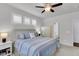 Relaxing main bedroom featuring plantation shutters, carpet, and a ceiling fan at 81 Crossandra Ave, Summerville, SC 29483