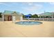 Community kiddie pool with shade and nearby seating area at 81 Crossandra Ave, Summerville, SC 29483