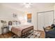 Bright bedroom with a cozy bed and a desk, creating a comfortable and productive space at 8268 Timberidge Ct, North Charleston, SC 29420