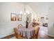 Cozy dining room features a chandelier and overlooks the living room at 8268 Timberidge Ct, North Charleston, SC 29420