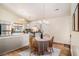 Bright kitchen featuring stainless steel appliances, granite countertops, and a cozy dining area at 8268 Timberidge Ct, North Charleston, SC 29420