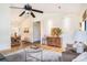 Open concept living room has vaulted ceilings and flows into dining area at 8268 Timberidge Ct, North Charleston, SC 29420