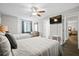 Bedroom featuring wood floors, bright light, and 2 twin beds at 856 Club Cottage Rd, Edisto Beach, SC 29438