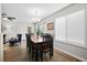 A bright dining area with wood floors and plenty of natural light at 856 Club Cottage Rd, Edisto Beach, SC 29438