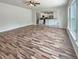 Spacious living room featuring new hardwood floors, abundant natural light and open layout to the kitchen at 982 Augustine Ct, Summerville, SC 29483
