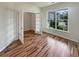Office with french doors and large window with a view of the neighborhood at 982 Augustine Ct, Summerville, SC 29483