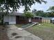 Charming single-story brick house with a ramp leading to the front door at 10 Cranford Rd, Goose Creek, SC 29445