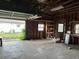 Spacious garage with concrete floors, wood-framed walls, and natural light from windows at 10 Cranford Rd, Goose Creek, SC 29445