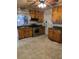 Kitchen featuring wood cabinets, stainless steel appliances, and a window at 10 Cranford Rd, Goose Creek, SC 29445