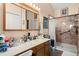 Well-lit bathroom featuring a single sink vanity, shower, and medicine cabinet at 102 Amberside Dr, Goose Creek, SC 29445
