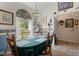 Quaint dining area with a table set for four and decorative wallpaper at 102 Amberside Dr, Goose Creek, SC 29445